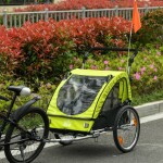 Kolesarska prikolica za otroke + jogger set za tekače – predstavitvena slika