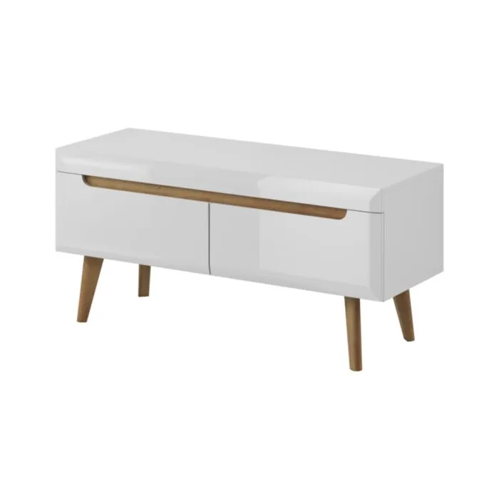 Dnevni TV regal RON 107 Dnevni tv regal s stilom skandinavskega sloga. Dobavljiv je v bela mat/bela visoki sijaj. Hrastove lesene noge, ABS robovi, vrata(ličnice) so MDF. Lahko ga