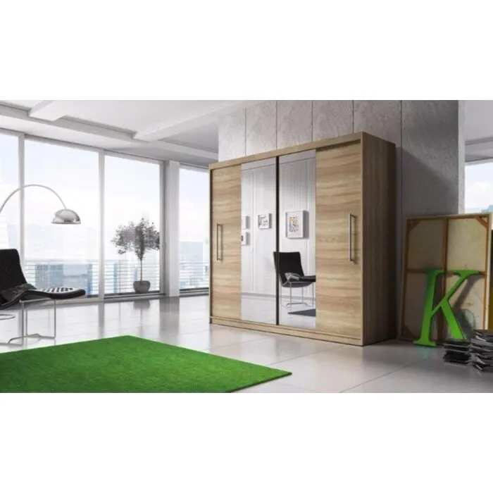 Drsna garderobna omara TARA Drsna garderobna omara TARA je primerna za vsako spalnico. Omara ima udobne ročaje in ogledala na sprednjih straneh, ki optično povečajo prostor. V