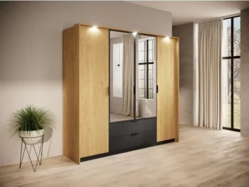 Elegantna in moderna garderobna omara BILI je narejena iz odličnih materialov v barvi hrasta s kombinacijo črne. Narejena je iz kakovostnega MDF-ja in ima