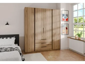 Garderobna omara KRISTINA 1 200 cm ima moderen dizajn. Narejena je iz laminirane plošče debeline 16 mm. Stranice kakor tudi fronte so v hrast barvi. Omara
