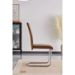 Jedilni stol DANA 2 je elegantne oblike in kakovostne izdelave. Njegov dizajn se bo podal v vsako jedilnico. Oblazinjen je v oker blagu, ki na videz spominja