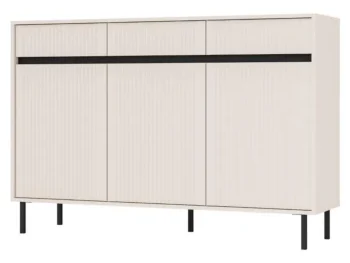 Komoda MILI bež je elegantna in funkcionalna izbira za vsak dom. Korpus je izdelan iz kakovostne laminirane plošče debeline 16 mm v nežni bež barvi, ki se