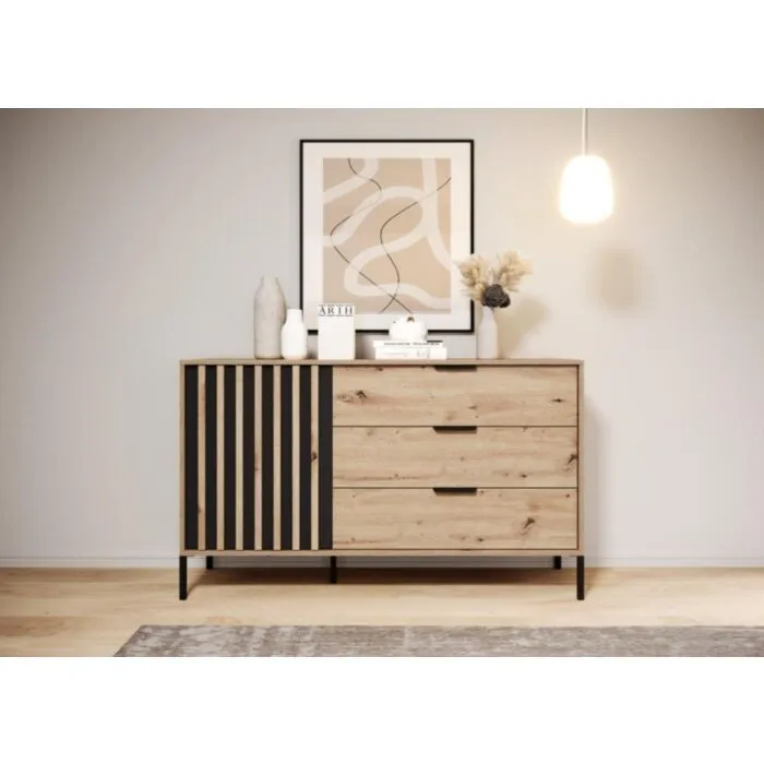 Komoda TINAJA Elegantna in moderna komoda TINAJA je eleganten kos pohištva, ki popestri vaš prostor. Njen poseben dizajn vas bo navdušil, saj prinese vašemu prostoru