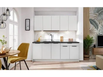 Kuhinjski blok JAGODA 200 cm je modernega dizajna v beli mat barvi. Stranice so narejene iz laminirane plošče debeline 16 mm, fronte pa debeline 18 mm.