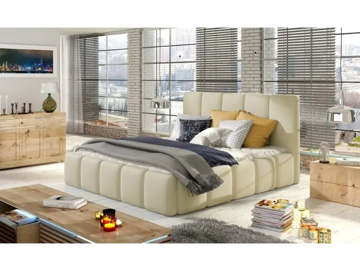 Postelja ELIZA 140 x 200 Sodobno oblazinjena postelja ELIZA modernega dizajna vam bo popestrila vaš prostor. Vsebuje letveno dno. Dobavljiva v več barvah blaga in umetnega usnja.