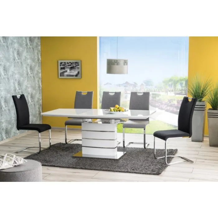 Raztegljiva jedilna miza LEON Moderna miza LEON je dobavljiva v beli barvi in MDF-ja. Miza je kvalitetna ter stabilna in primerna za vsako kuhinjo. Barva: - bela visoki sijaj Material: -