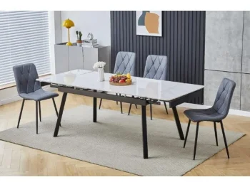 Raztegljiva jedilna miza LOLA je modernega ter eleganttnega dizajna. Mizna plošča je narejena iz kvalitetne keramike v videzu marmorja, v beli visoki sijaj