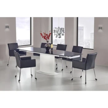 Jedilna miza ROSA se odlično poda v vsako jedilnico. Narejena je iz kovinskega podnožja, mizna plošča je steklena. Miza je raztegljiva. Barva: bela/črna