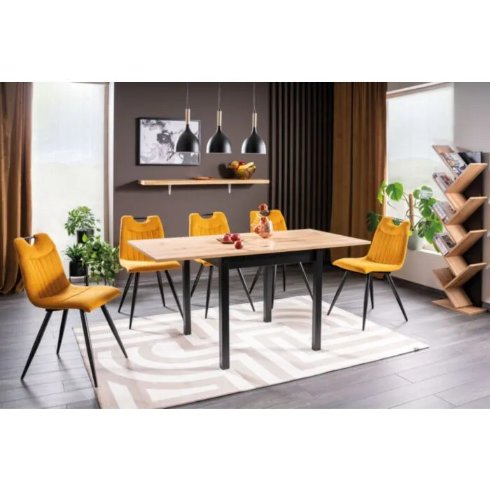 Raztegljiva jedilna miza SUE Raztegljiva jedilna miza SUE je narejena iz kvalitetne laminirane plošče, v barvi hrasta. Nogice pa so črne barve. Miza je praktična za uporabo saj se iz