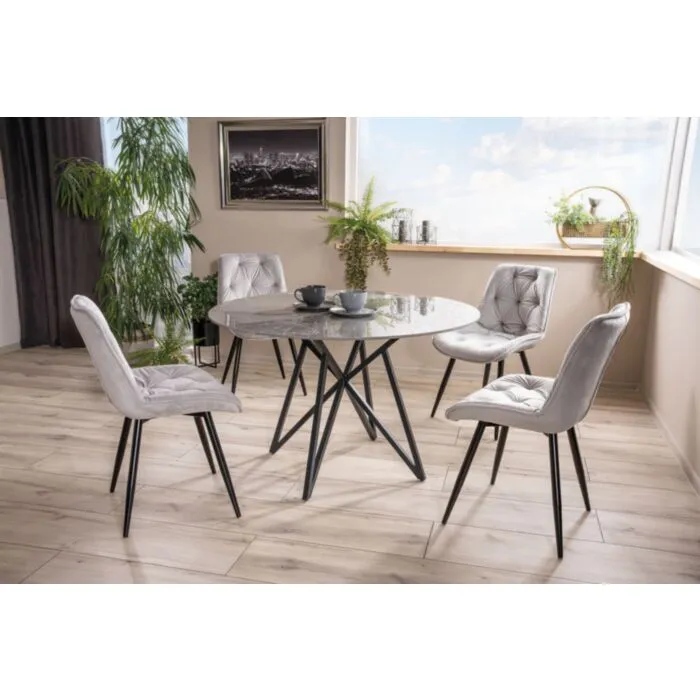 Jedilna miza RANO Jedilna miza RANO je modernega videza ter kvalitetne izdelave. Mizna plošča je narejena iz keramike v videzu marmorja, ki je na voljo v dveh različnih