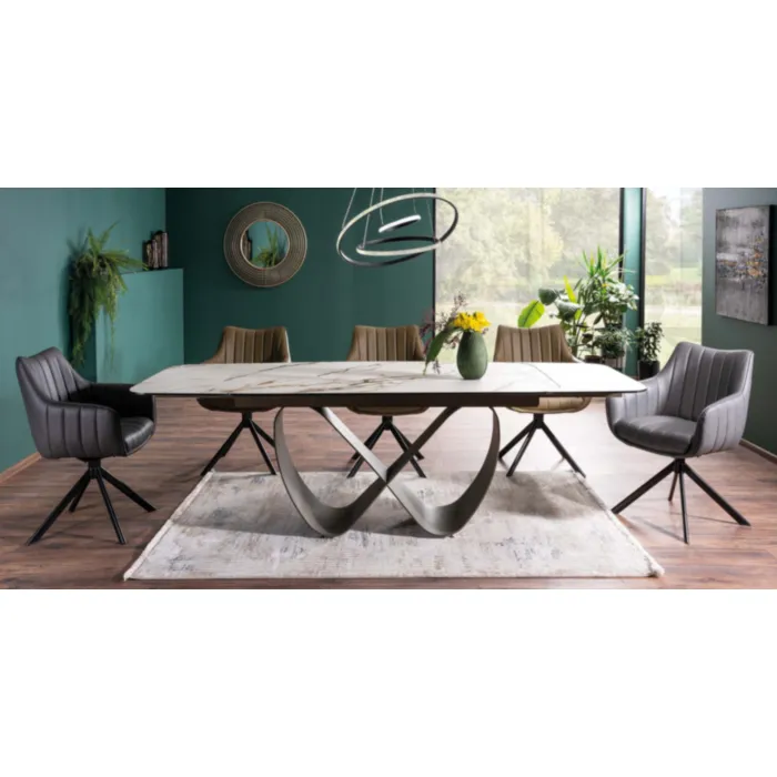 Raztegljiva jedilna miza ČOKI 160 Raztegljiva jedilna miza ČOKI 160 je izdelana iz visokokakovostnega kaljenega stekla. Izstopala bo zaradi svojega izjemnega dizajna nog. Ker ima možnost da