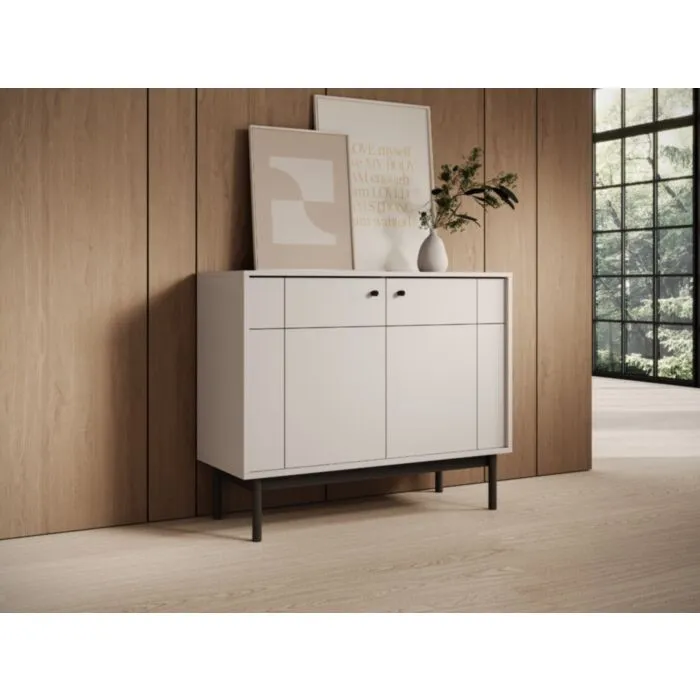 Komoda JAPONI 104 kašmir Komoda JAPONI 104 kašmir je elegantna in preprosta. Odlično se poda v vsak dnevni prostor. Narejena je iz visokokakovostnih materialov, kar zagotavlja