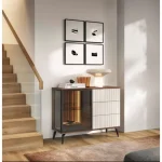 Komoda VILMA MINI je sodobna in elegantna. Narejena je iz kakovostnega MDF-ja in visokokakovostnega stekla. Zaradi svoje oblike in visokokakovostnih materialov