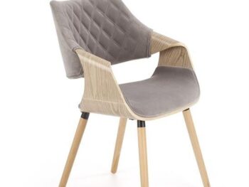 Jedilni stol K396 je dobavljiv v barvi svetli hrast in v sivi tkanini. Noge stola so iz masivnega lesa. Dimenzija: - Š:56/G:55/V:77 cm, Material: - blago -