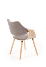 Jedilni stol K396 je dobavljiv v barvi svetli hrast in v sivi tkanini. Noge stola so iz masivnega lesa. Dimenzija: - Š:56/G:55/V:77 cm, Material: - blago -