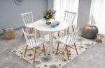 Raztegljiva jedilna miza RINGO bela je narejena iz kakovostne furnirane plošče v kombinaciji z MDF-jem. Nogice in mizna plošča so v beli barvi. Barva: -